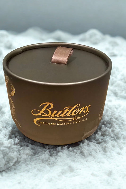 Gold Powder Puff box containing indulgent Butlers Milk Chocolate Flake Truffles