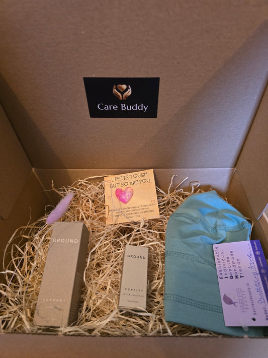 Chemo Care Buddy Box including a soft Sleep Cap, Ground Wellbeing Nail & Cuticle Oil, Ground Wellbeing Scalp Oil and a Pocket Heart