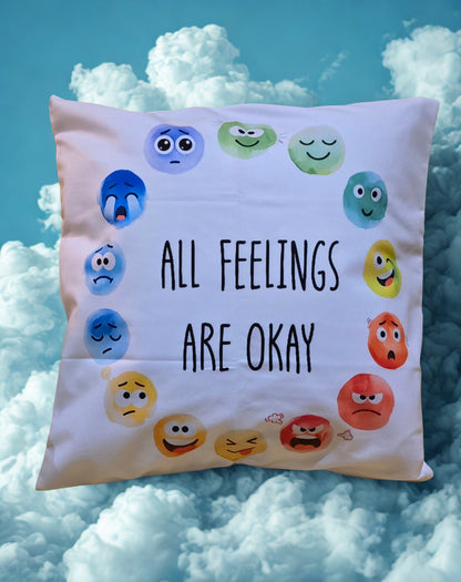 Cushion with emoji faces and 'All Feelings Are Okay' text on the Cushion Colourful emojis of all different feelings