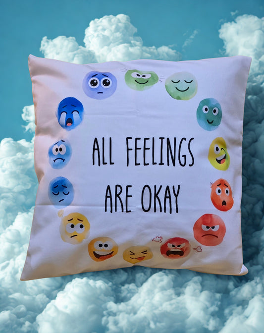 Cushion with emoji faces and 'All Feelings Are Okay' text on the Cushion Colourful emojis of all different feelings