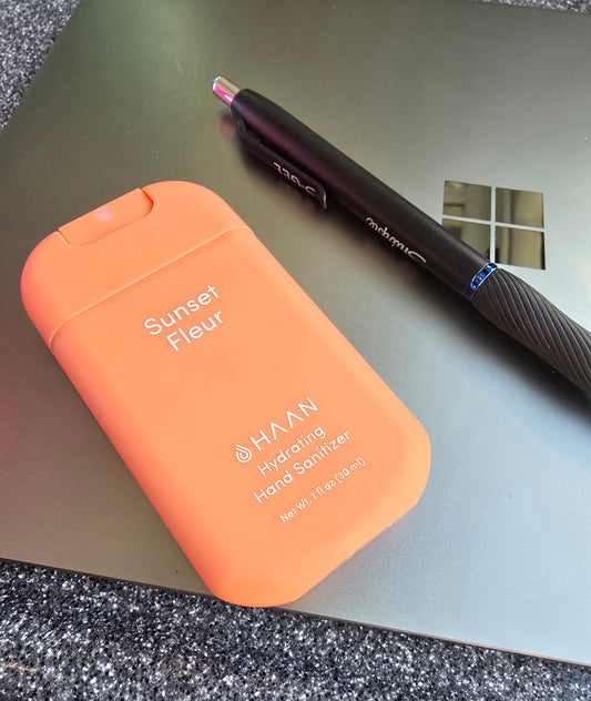 HAAN Orange hand sanitizer with 'Sunset Fleur' ideal for out and about and hospital visits to keep sanitized