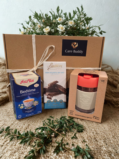 Gift box from Care Buddy with Yogi Tea, Butter's Irish Sea Salt and a Monkey Cup Reusable glass cup